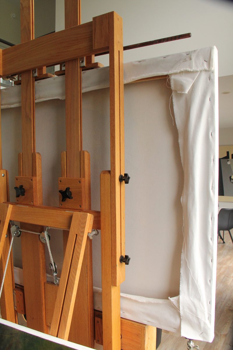 Back of a heavy-duty handmade canvas on an easel
